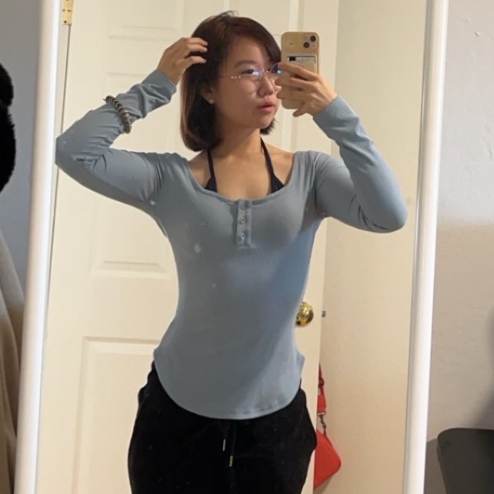 Tight fitting ribbed blue halter neck top